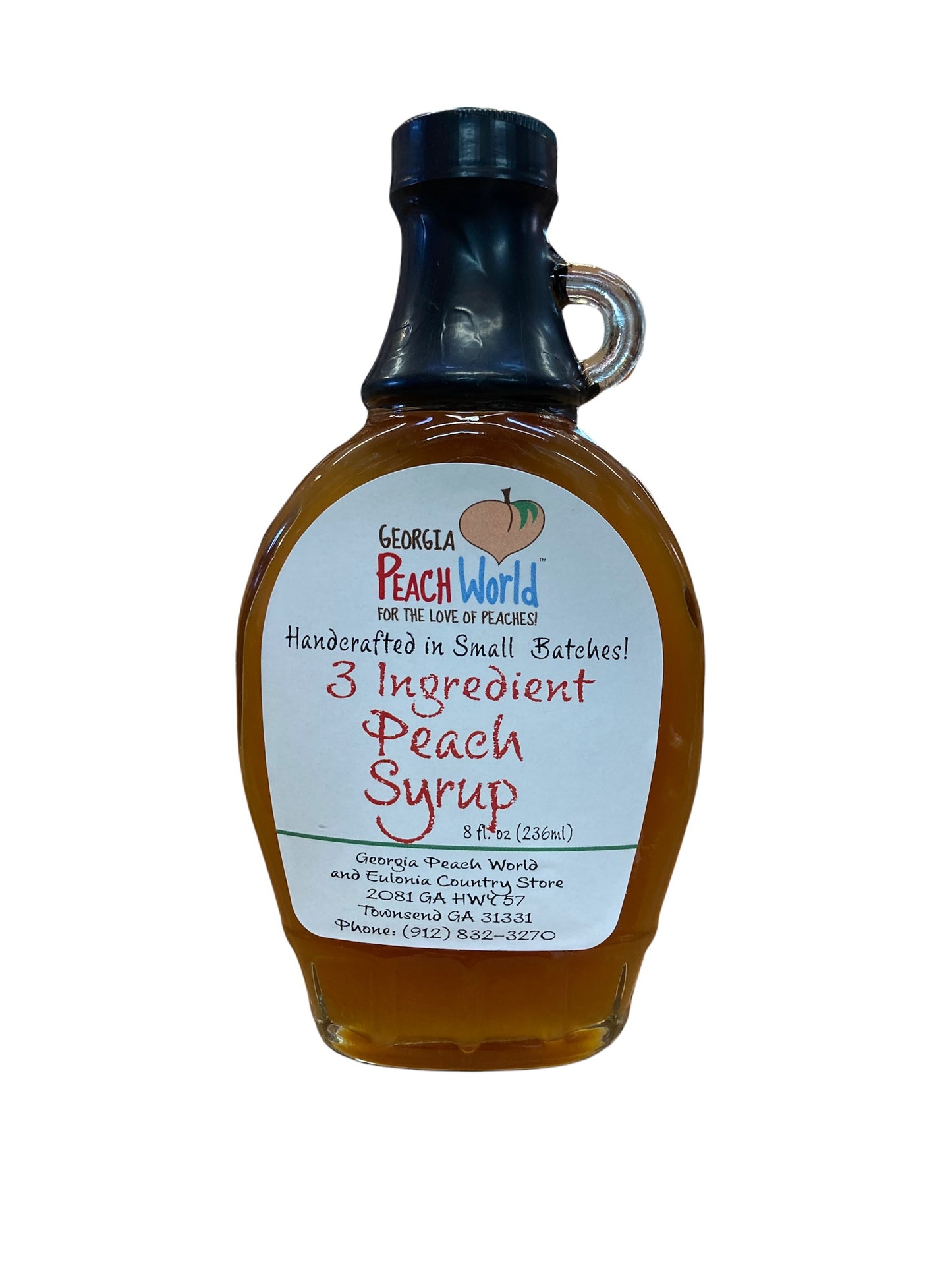 Glass handle bottle with shrink wrapped lid containing peach syrup