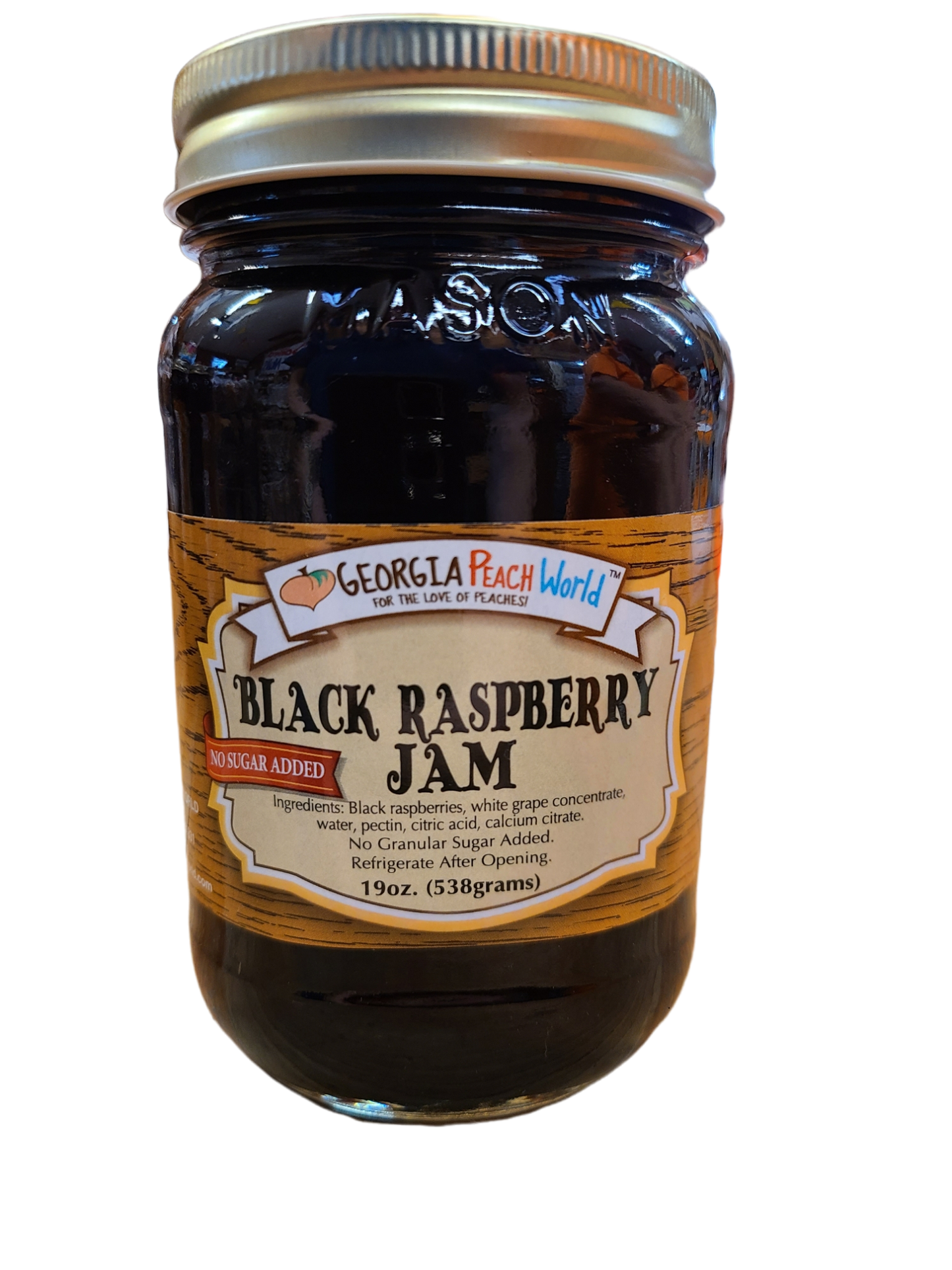 Standard glass Mason Jar containing Standard Mason Jar containing no sugar added black raspberry jam