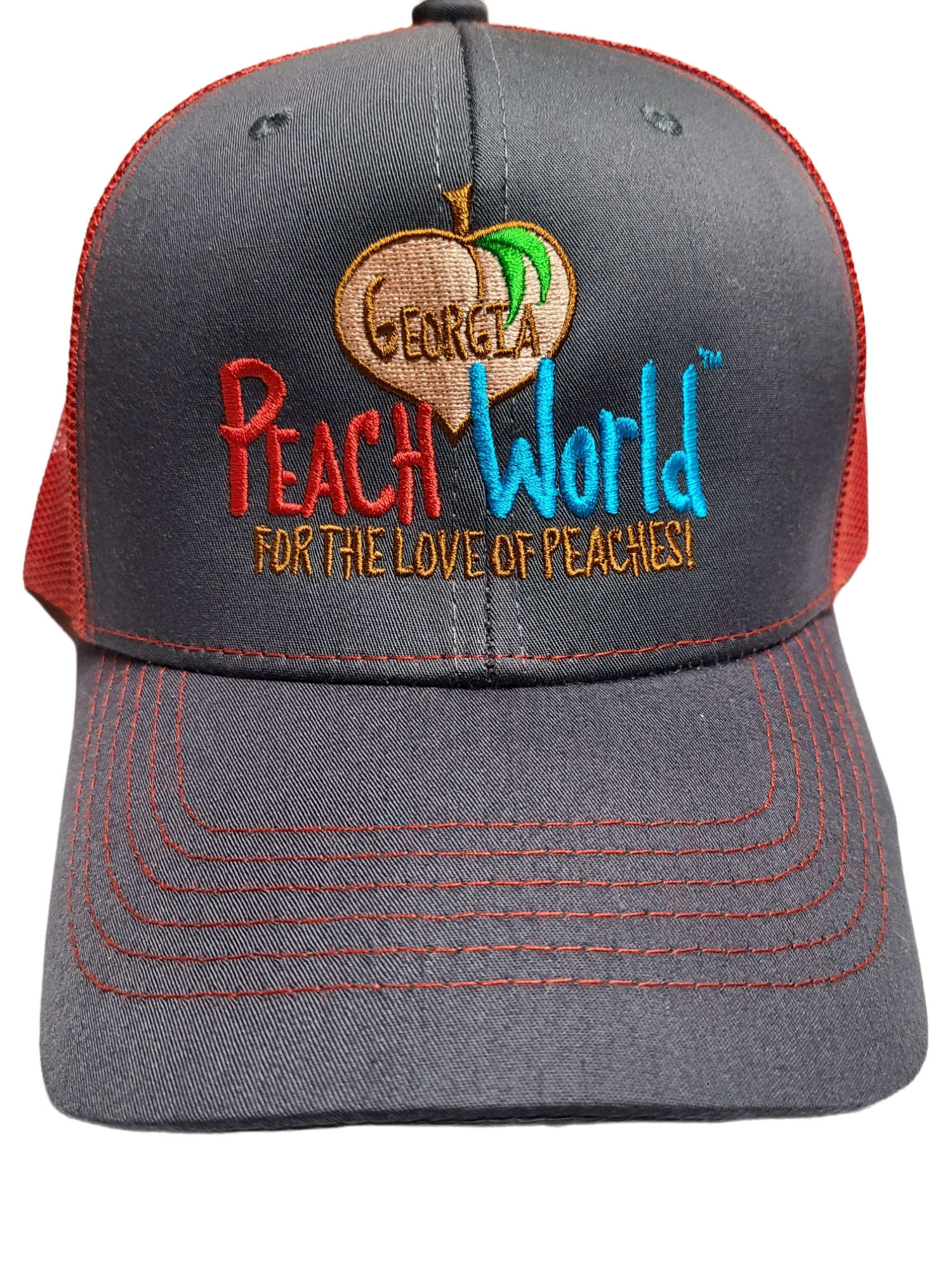 Charcoal colored Richardson brand trucker style hat with a red mesh back printed with Georgia Peach World branding logo